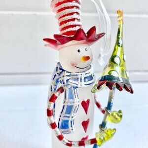ANthropomorphic Snowman Ornament Holding Christmas Tree or Christmas Umbrella(?)